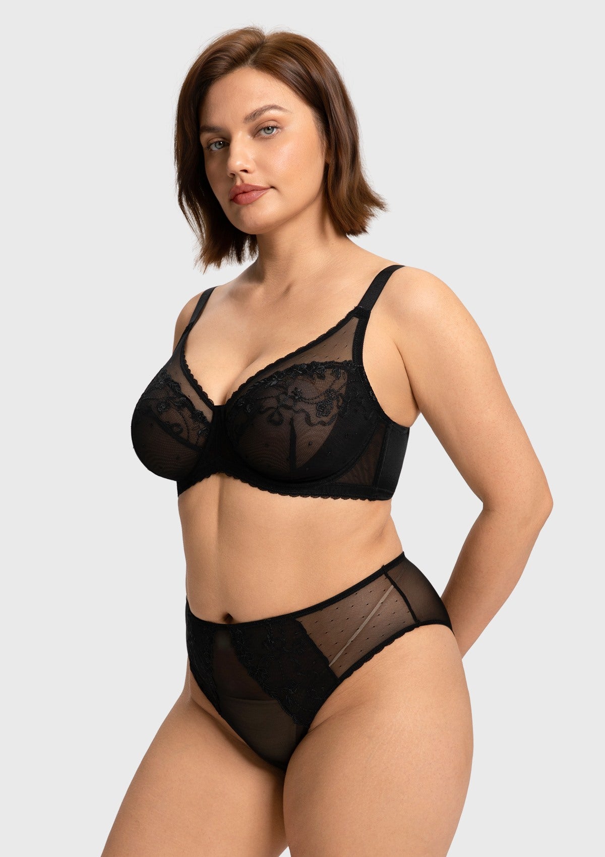 Side angle of the black supportive lace bra for heavy breasts, demonstrating a naturally rounded lift without adding bulky padding.