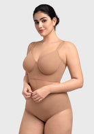 Side angle showing the natural contouring of the caramel unlined minimizing bra without adding any extra bulk
