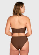 Back view of the coffee brown convertible strapless bra, showcasing the breathable back lining and customizable straps for plunging necklines.