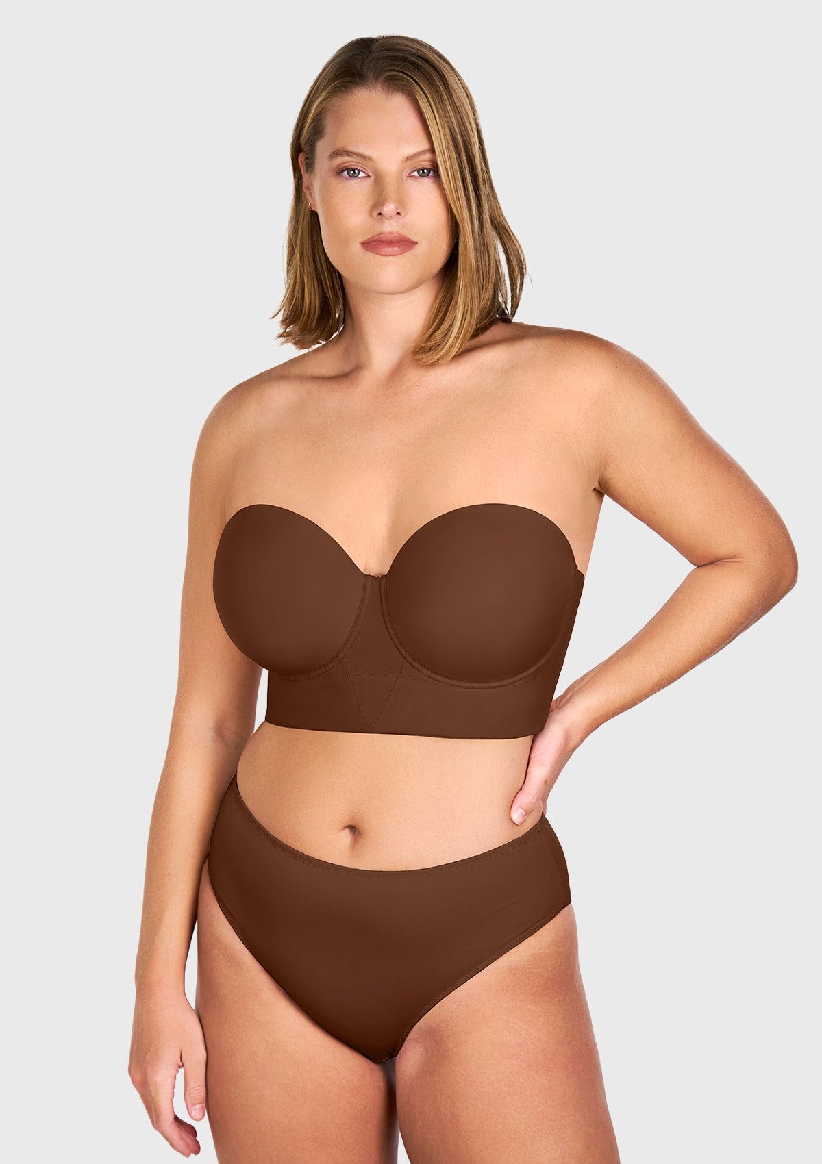 Front view of the coffee brown longline strapless balconette bra, acting as the perfect invisible nude bra for darker skin tones.