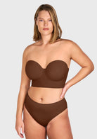 Front view of the coffee brown longline strapless balconette bra, acting as the perfect invisible nude bra for darker skin tones.