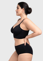 Side view capturing the breathable mesh wings of the black cooling bra, keeping you fresh all day long