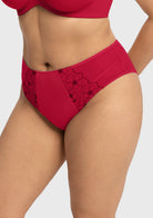 Rear view of the Coral Red full coverage panty, perfectly designed to smooth curves and provide a comfortable, confidence-boosting fit.