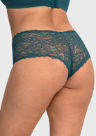 Rear view of model in the balsam blue high waist lace boyshort, showcasing full back coverage that comfortably flatters natural body lines.