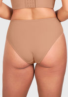 Rear view of model wearing the dark beige high waist seamless underwear, showing off a smooth finish with zero visible panty lines.