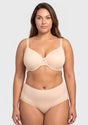 Front view of model in the Light Beige HSIA Mia full coverage bra, an essential invisible cooling layer under white T-shirts for big busted women.
