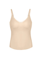 High-resolution 3D detail of the HSIA nude wire-free padded camisole, emphasizing the breathable bidirectional stretch fabric and seamless edges.