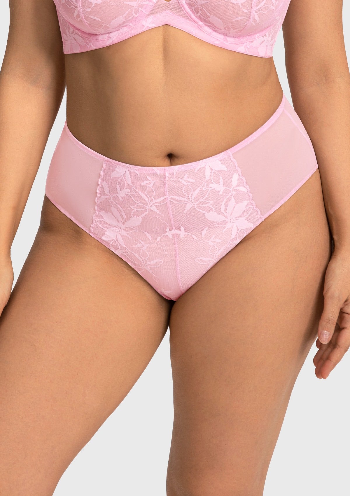 Front view of the romantic soft pink lace high waist panty on model, perfect for pairing with matching Petalia balconette bras.