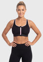 Front view of model in the classic Black HSIA Speed Race front closure sports bra, an effortless and supportive post surgery front zip bra for large busts.