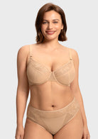 Front view of model wearing the Light Beige HSIA Yumi unlined bra, an everyday essential providing an alluring sheer look and full coverage support.