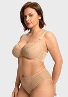 Side view of the Light Beige elegant sculpting bra on model, highlighting beautiful forward projection and natural lift for pendulous breast shapes.