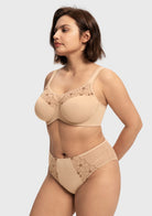 45-degree angle of the light beige full coverage bra, highlighting the reinforced side panels that gently smooth underarm bulges for a sleek silhouette.