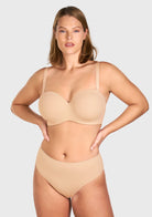 Front view of the black strapless bra worn with convertible straps for daily support