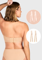 Close-up showing both matching black straps and bonus clear invisible straps included