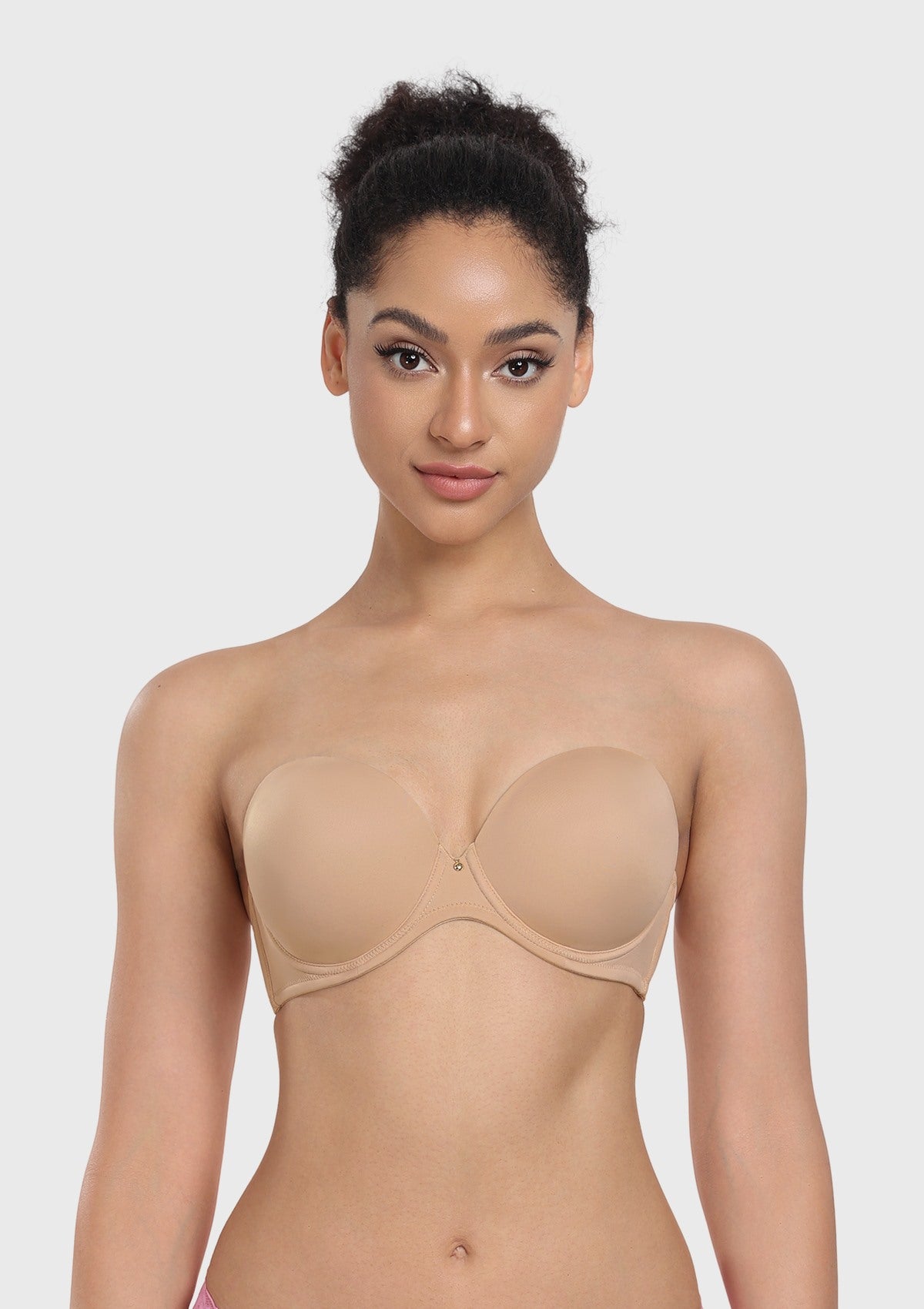 Front view of the light nude full coverage strapless bra, providing an invisible, secure fit under wedding gowns and light-colored dresses.
