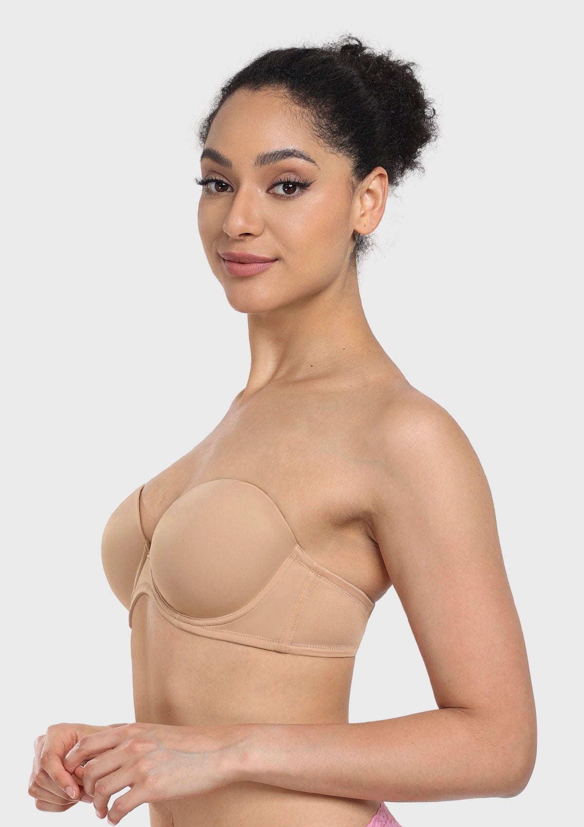 45-degree angle of the nude lightly lined strapless bra, naturally shaping the breasts with a beautiful curve without adding bulk.