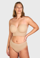 Front view of the light nude seamless strapless bra, effortlessly disappearing under tight-fitting or light-colored clothing.