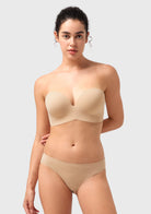 Front view of the light nude seamless wireless strapless bra, offering a completely invisible finish under any light-colored outfit.