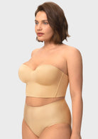 Three-quarter profile of the nude underwired strapless corset bra, highlighting beautiful lift, side containment, and natural shaping for large breasts.