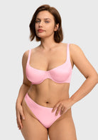 Front view of the Victoria pink romantic satin T-shirt bra, offering a beautiful, natural shape and completely invisible look under tight tops.