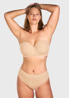 Front view of woman wearing the black HSIA seamless non-slip strapless bra